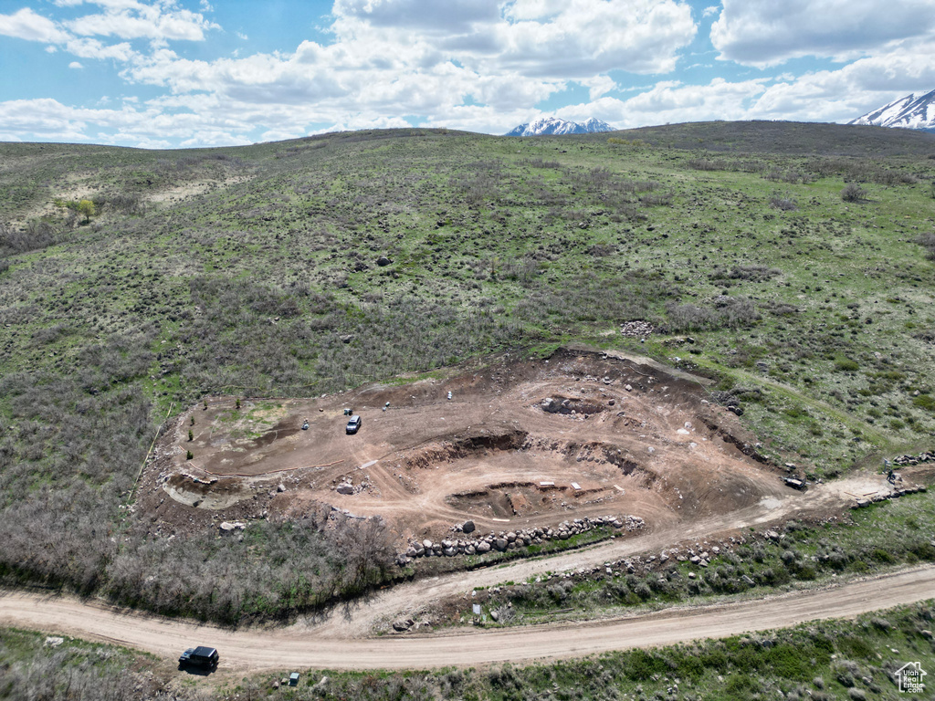 Aerial overview of property\'s location with a mountain backdrop