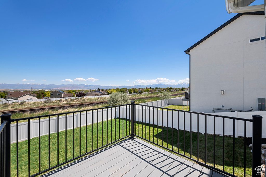 Balcony with a mountain view and a residential view