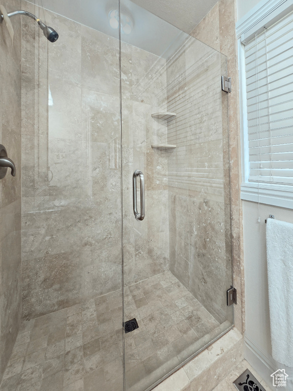 Bathroom featuring a stall shower