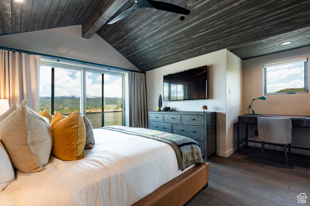 Bedroom with multiple windows, dark wood-style flooring, access to exterior, baseboards, and wood ceiling