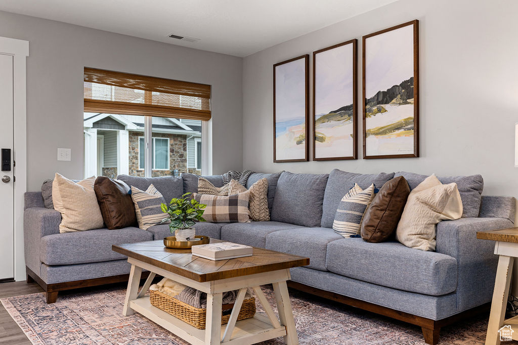 Living room with light wood-style floors