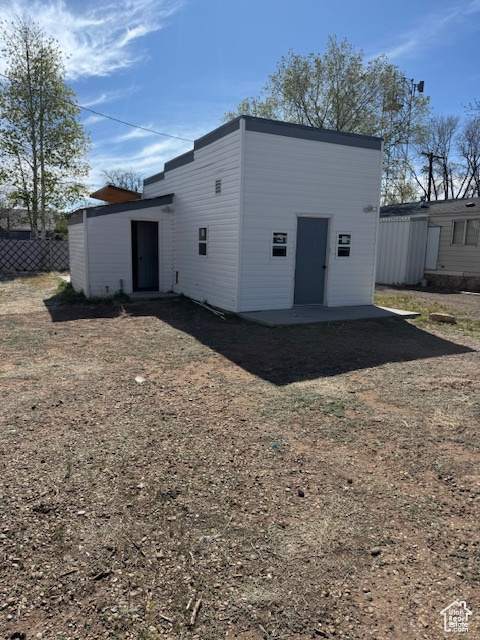 Back of property with fence