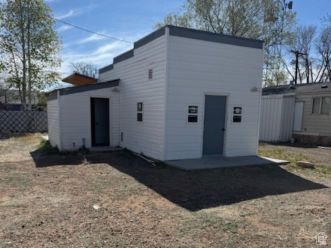 Back of property with fence