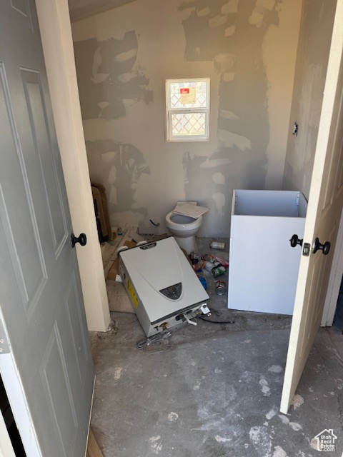 Bathroom with radiator and toilet