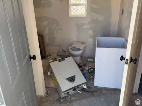 Bathroom with radiator and toilet