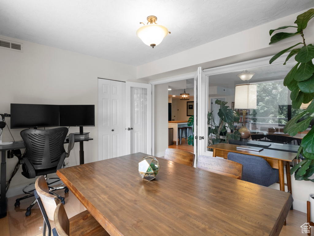 Office space with wood finished floors