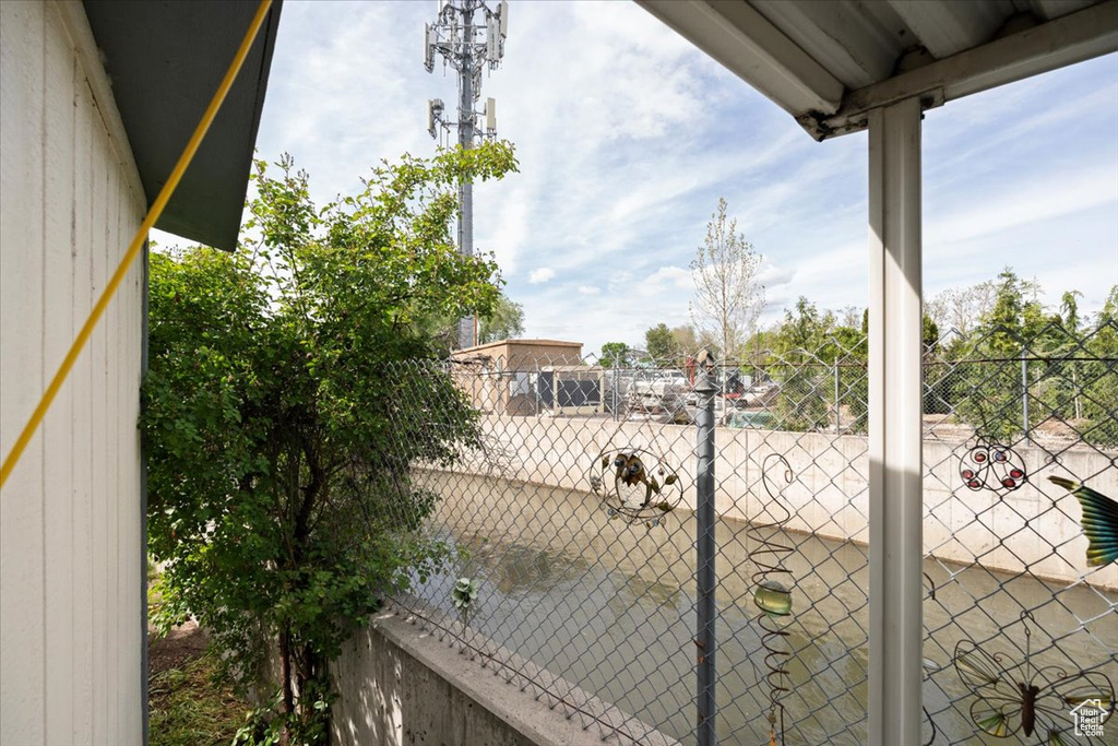 View of yard featuring fence