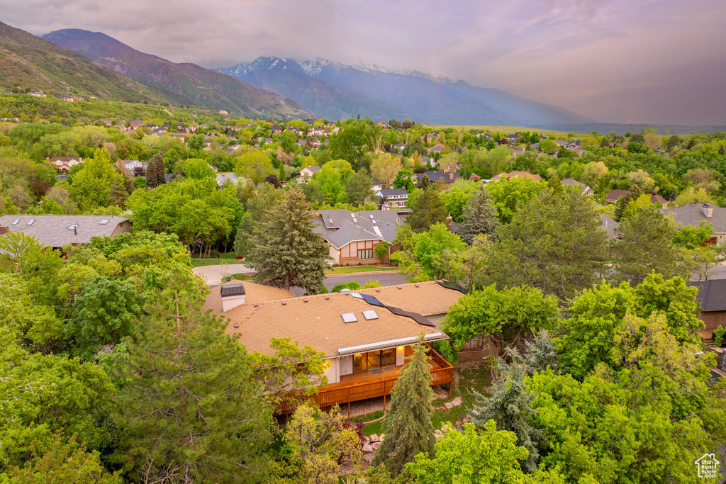 Aerial view at dusk with a residential view and a mountain view