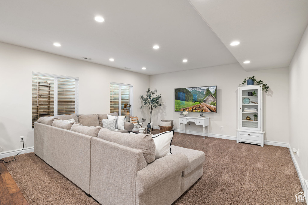 Living area featuring recessed lighting and baseboards