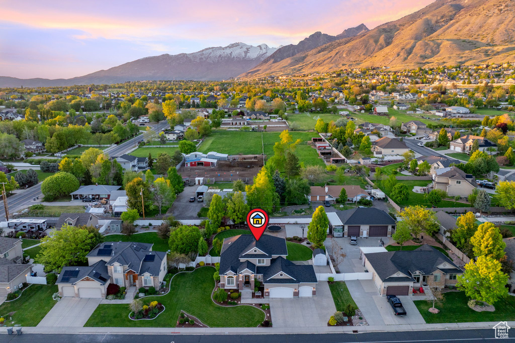 Aerial view at dusk of a mountain view and a residential view