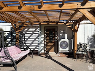 View of patio featuring a pergola