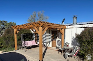 View of patio / terrace featuring a pergola