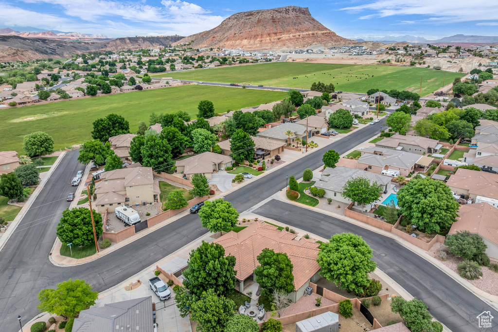 Aerial view of residential area featuring mountains