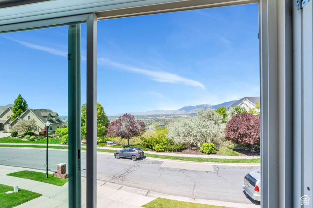 Interior space with sidewalks and a mountain view