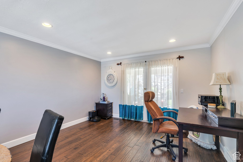 Office space featuring crown molding, wood finished floors, baseboards, and recessed lighting