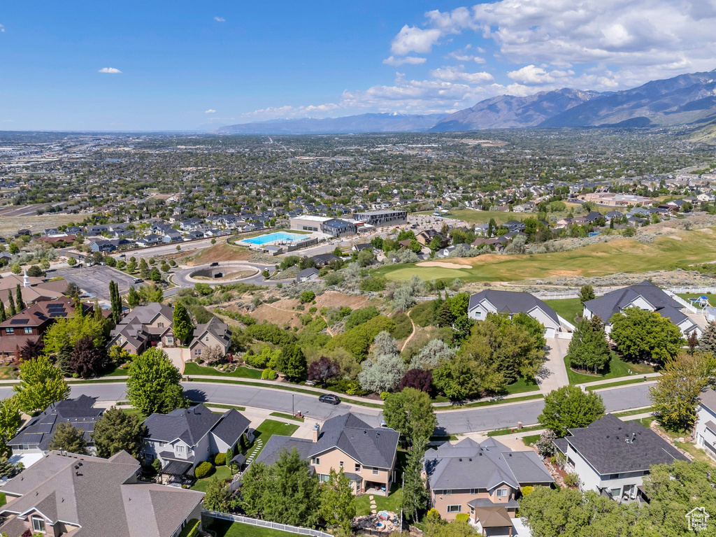 Aerial view of residential area with a mountain backdrop