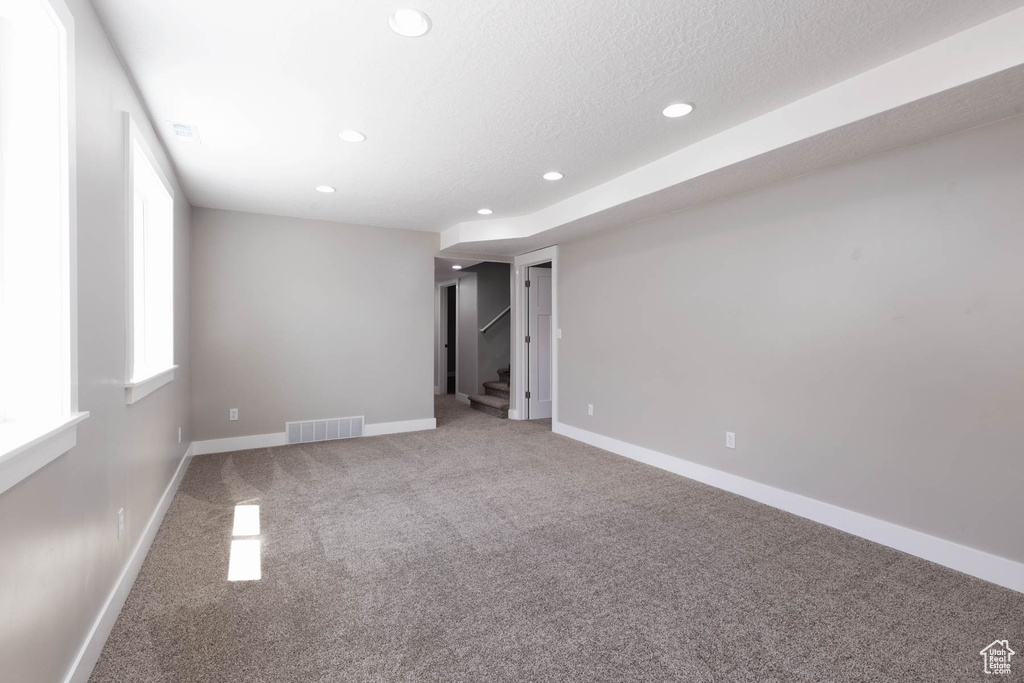 Unfurnished bedroom with carpet floors, recessed lighting, and baseboards