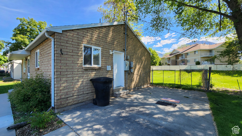 Rear view of property featuring a patio