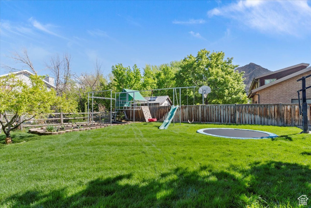 View of yard with a playground