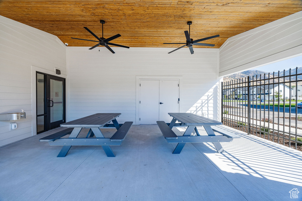 View of patio featuring ceiling fan and outdoor dining area