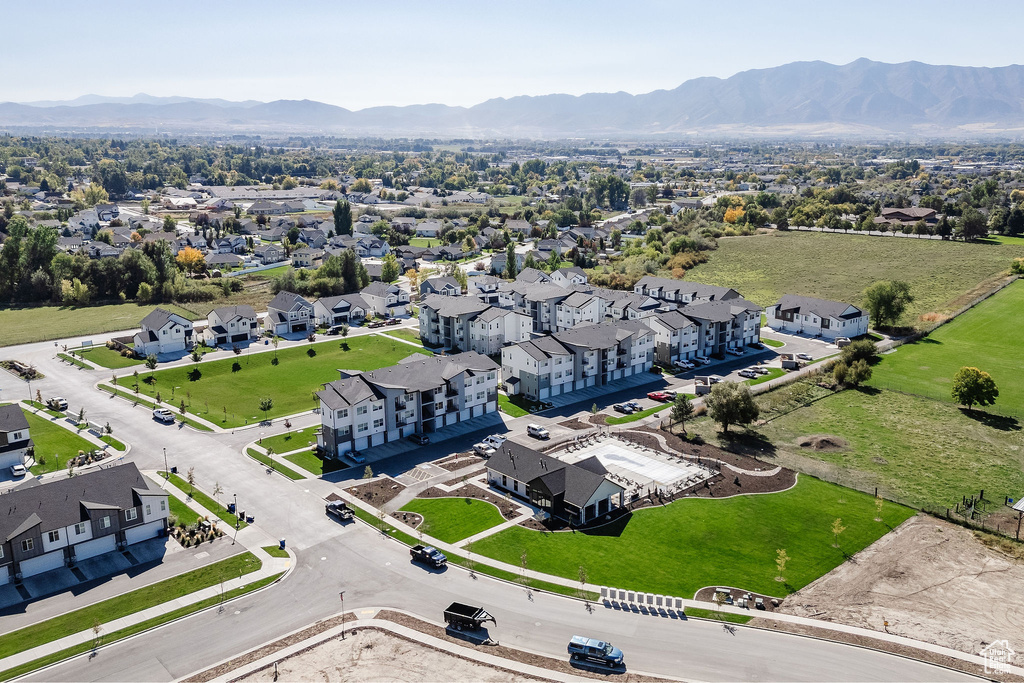 Aerial view of residential area with a mountainous background