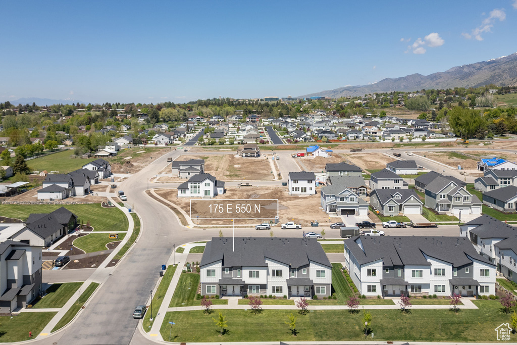 Aerial view of residential area with mountains