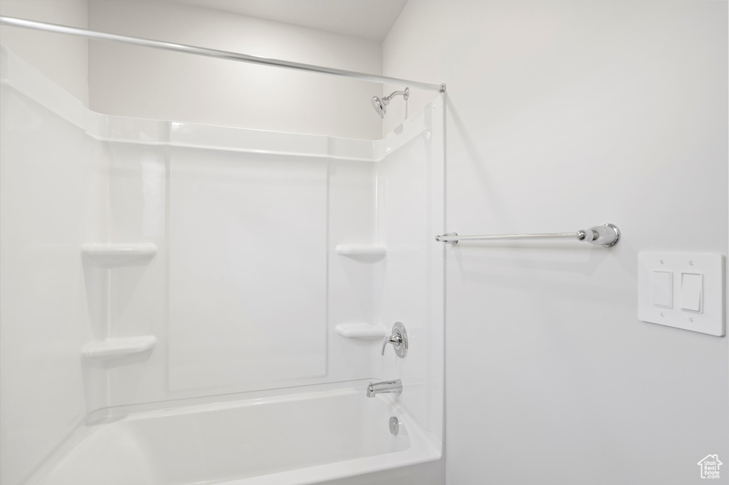 Bathroom featuring bathing tub / shower combination