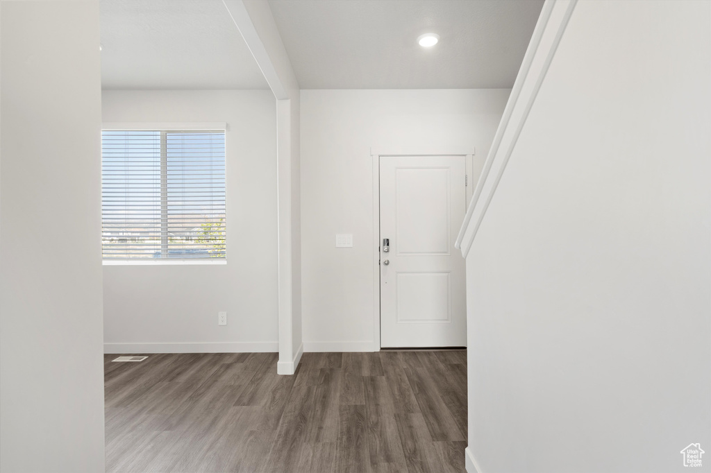 Entryway featuring wood finished floors and recessed lighting