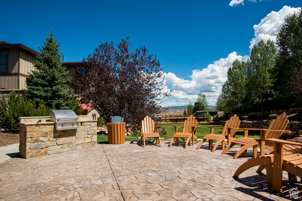 View of patio / terrace featuring area for grilling and a grill