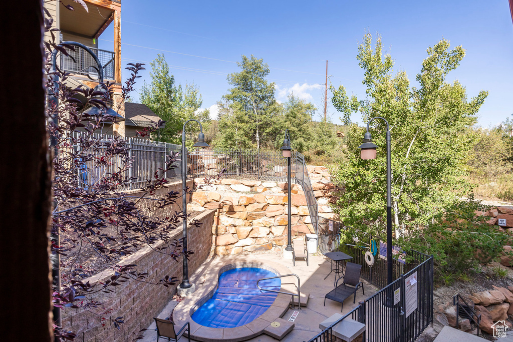 View of yard featuring a patio and fence