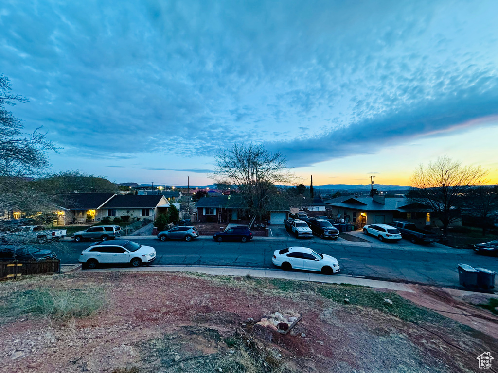 View of parking featuring a residential view