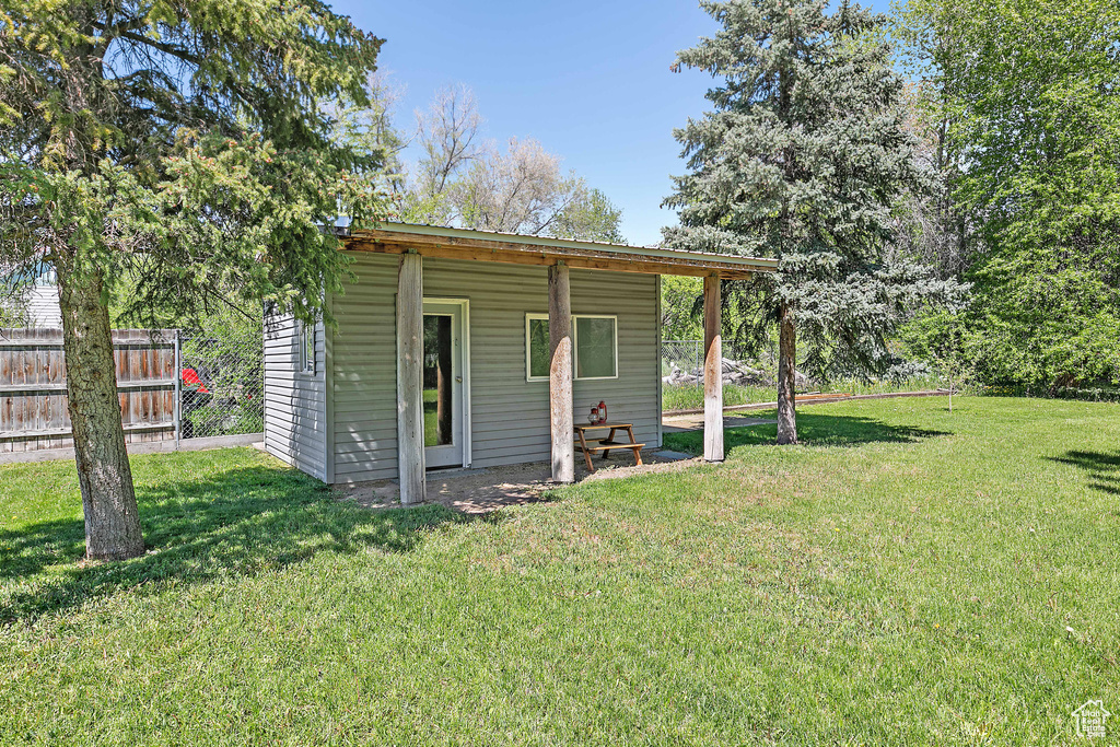 View of outdoor structure with fence