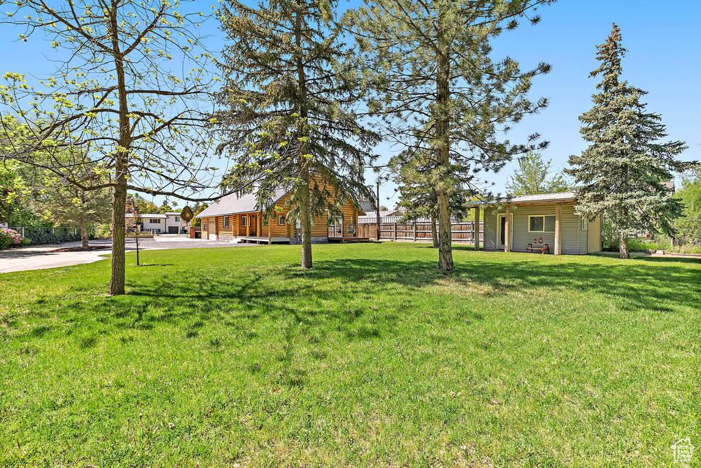 View of yard with fence