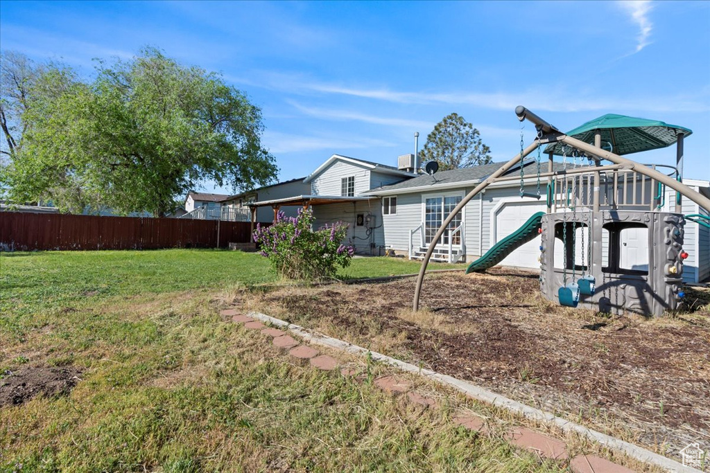 View of yard with a playground