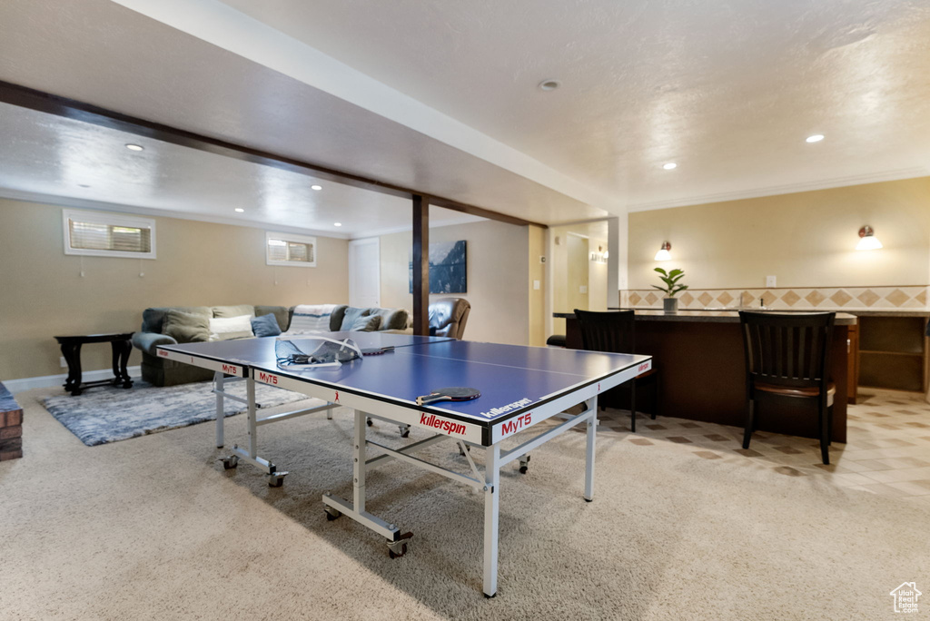 Rec room with light carpet and recessed lighting