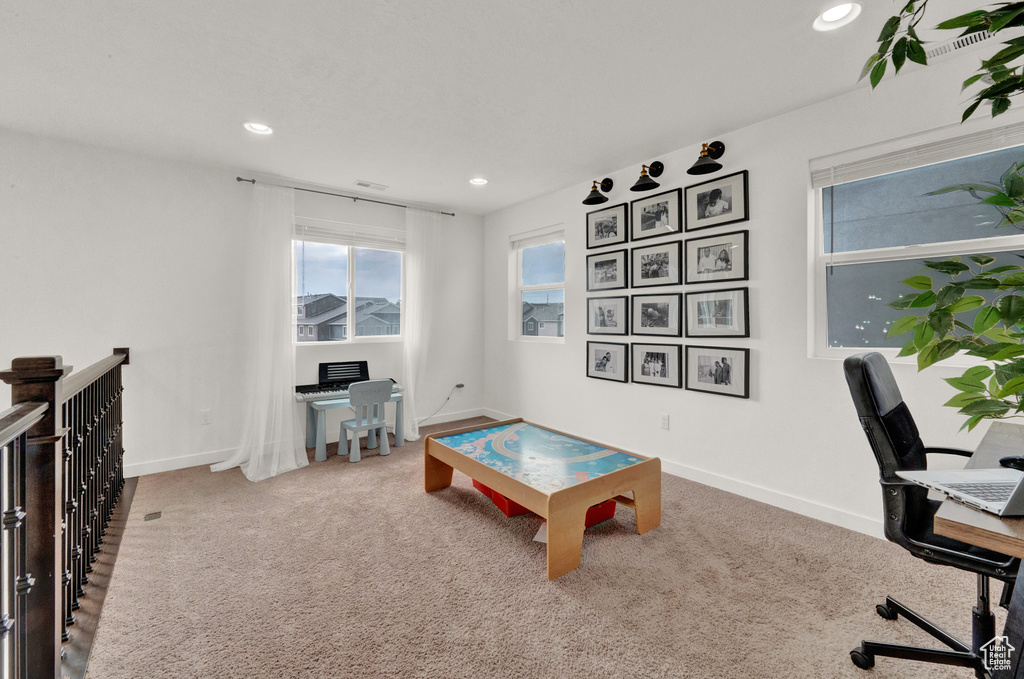 Carpeted office featuring recessed lighting and baseboards