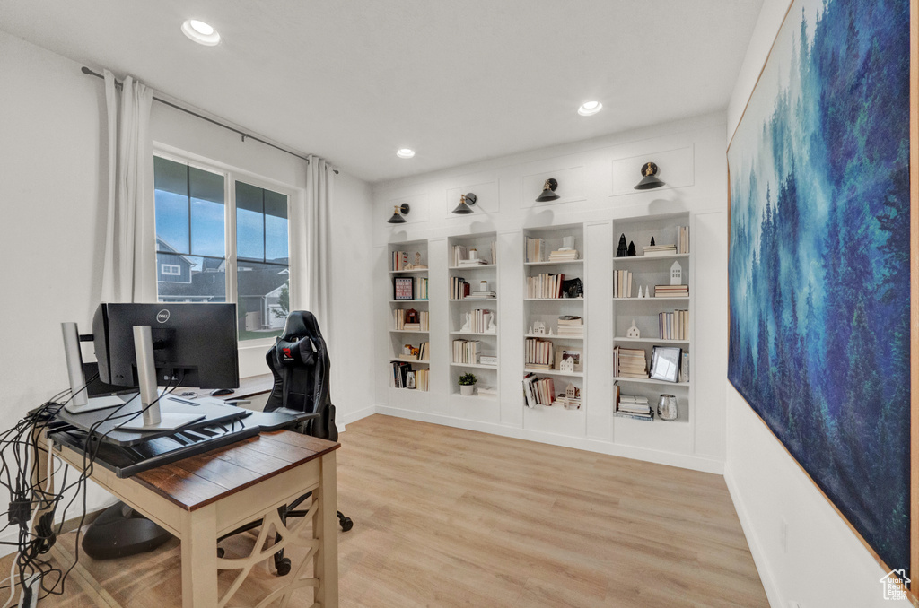 Office with light wood-type flooring, recessed lighting, and baseboards