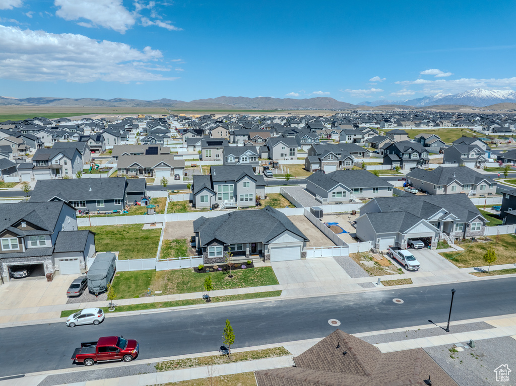 Aerial perspective of suburban area featuring mountains
