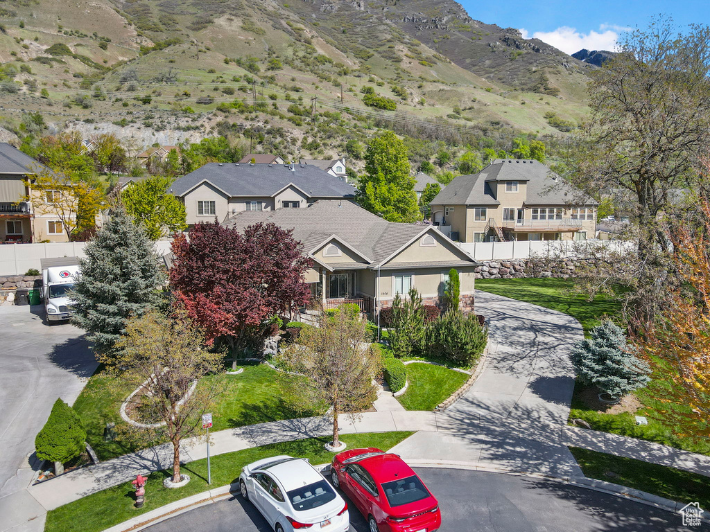 Birds eye view of property featuring a residential view and a mountain view