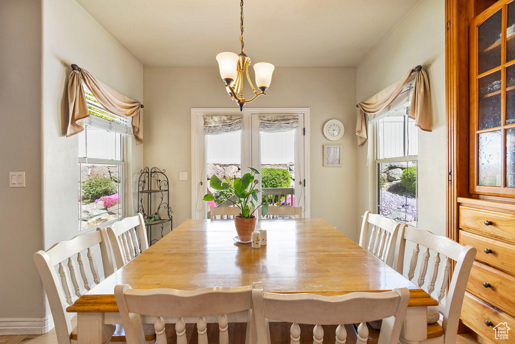 Dining space with a notable chandelier