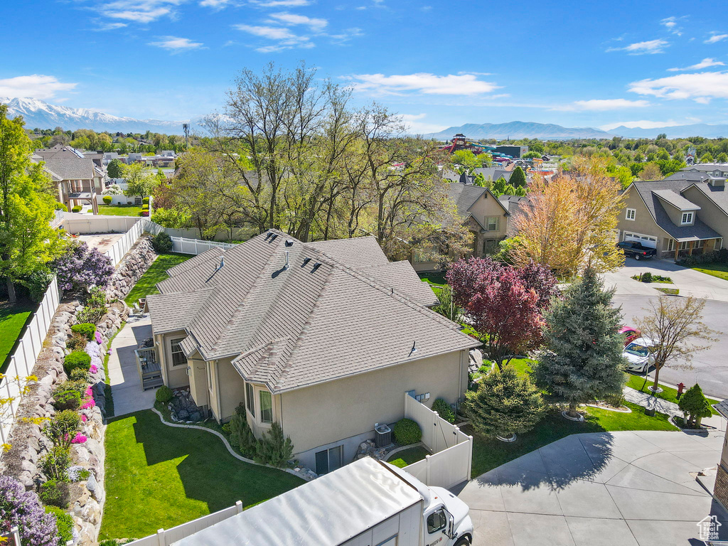 Drone / aerial view featuring a residential view and a mountain view