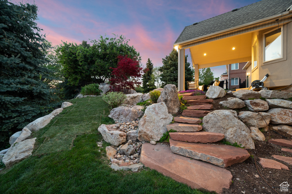 View of yard at dusk