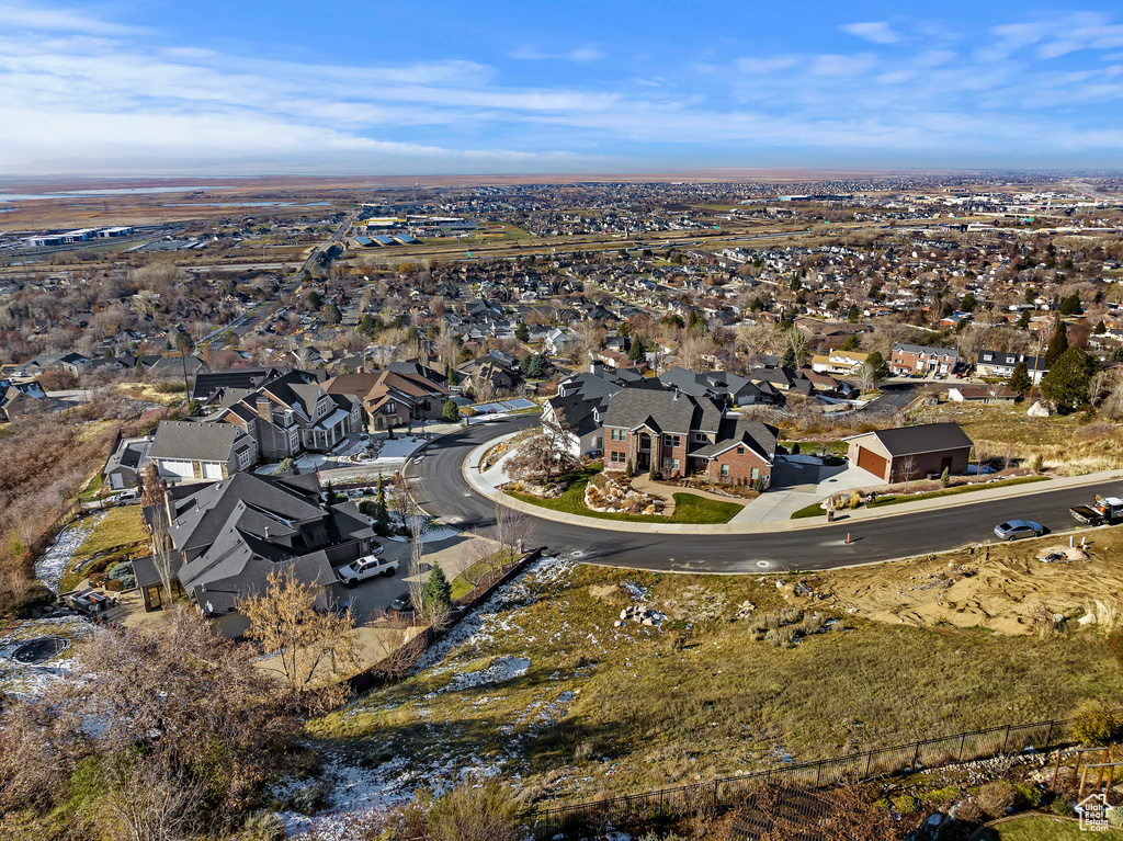 Aerial overview of property's location featuring nearby suburban area