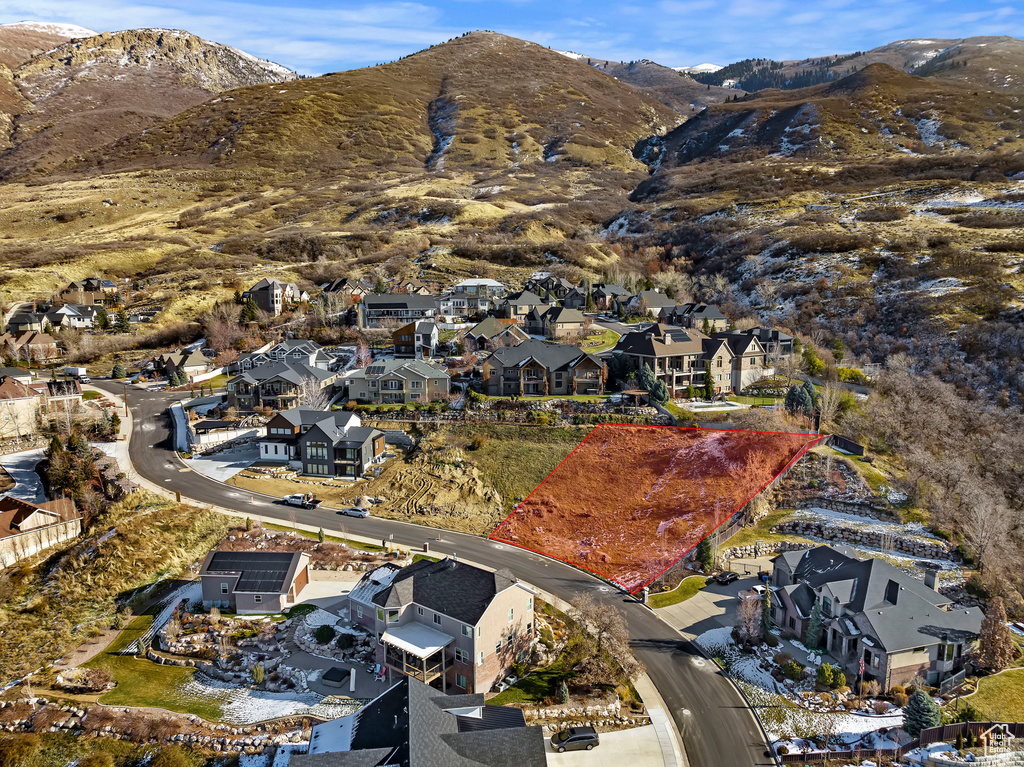 Aerial perspective of suburban area featuring mountains