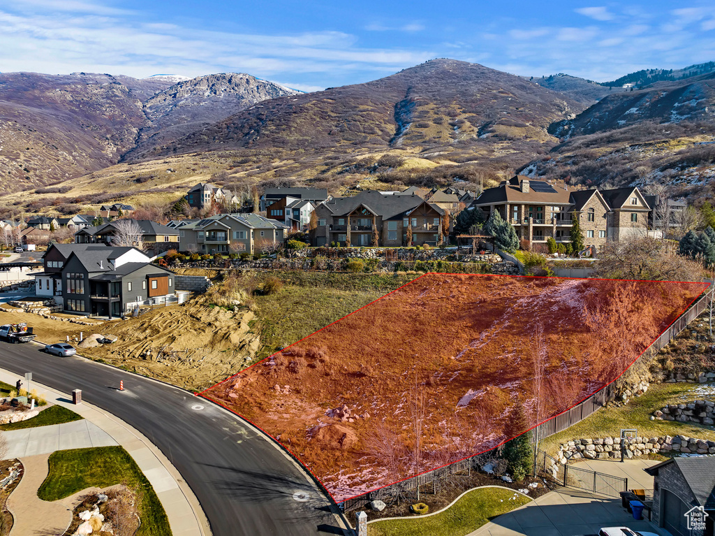 View of mountain backdrop with nearby suburban area