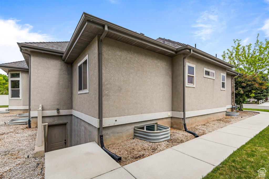 View of home\\\\\\\'s exterior featuring stucco siding