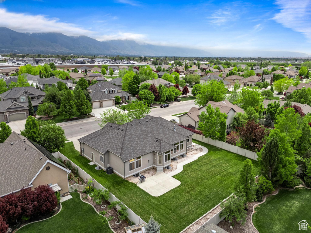 Aerial view of residential area with mountains