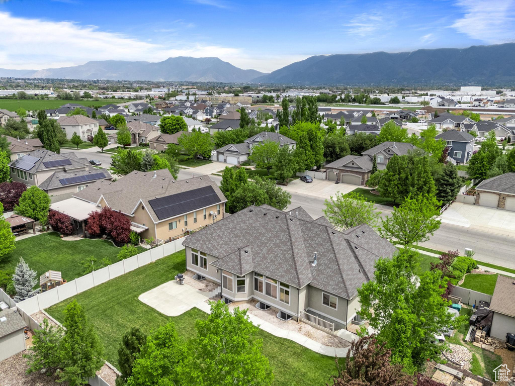 Aerial perspective of suburban area featuring mountains