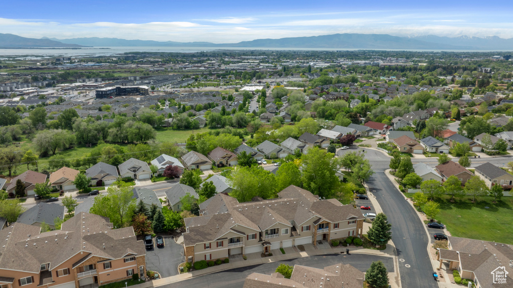 View of property location featuring mountains and nearby suburban area