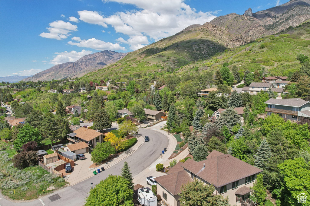 Aerial view of residential area with a mountain backdrop